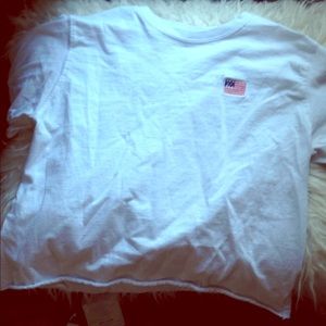 Long sleeved cropped/ mid-waist shirt